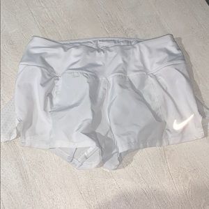 White Nike shorts